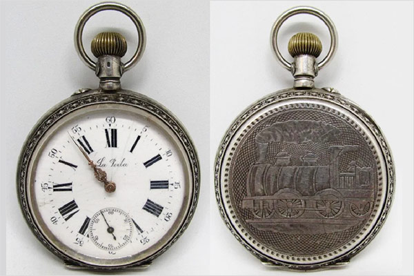 An open-face railroad pocket watch with sterling silver